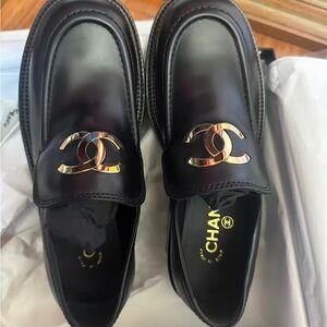 CHANEL Black Loafers with Gold Logo